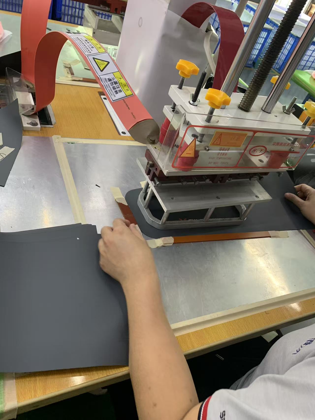 Sealock workers are operating RF welding machines to weld products. Sealock workers are operating RF welding machines to weld products.
